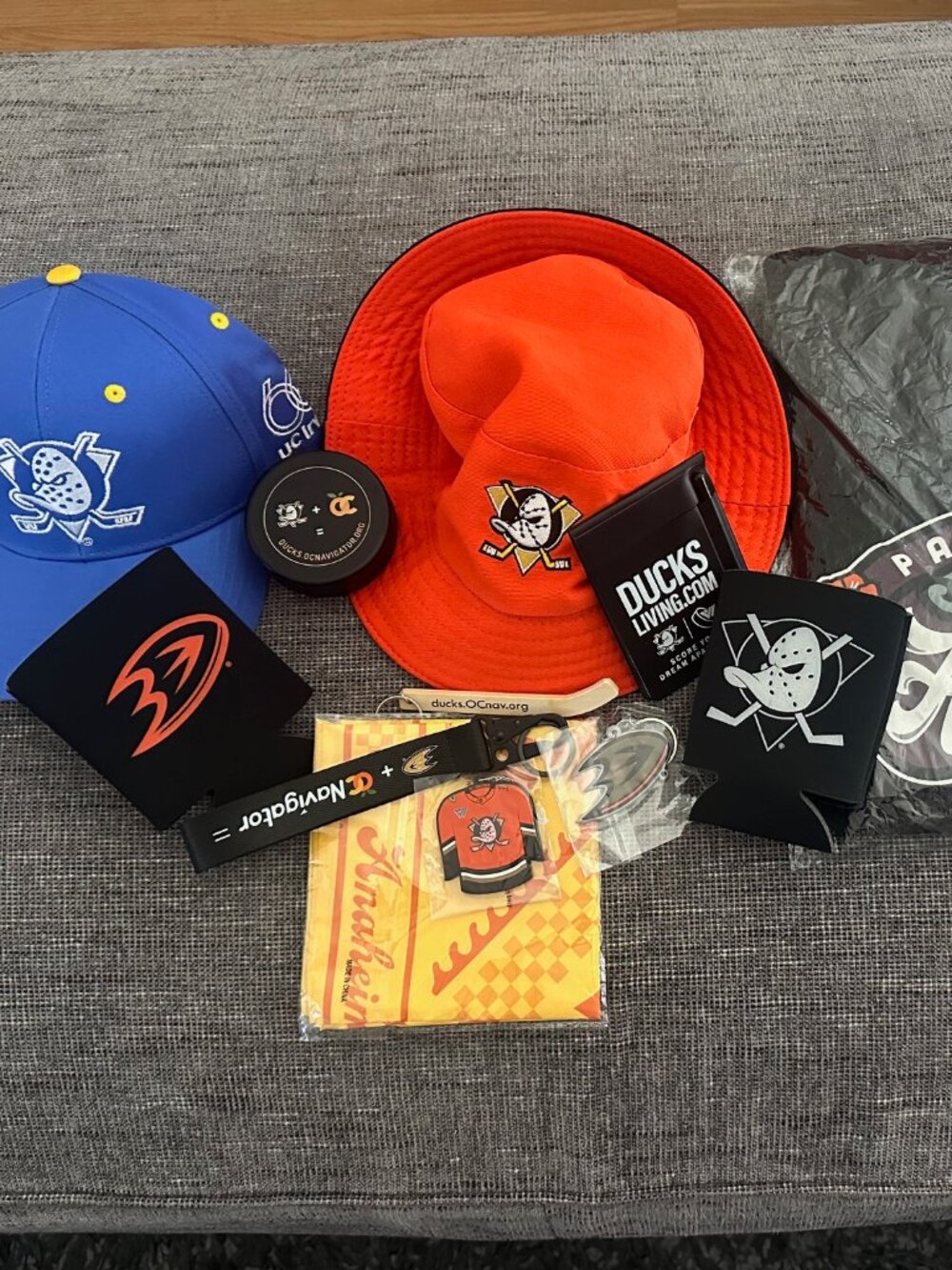 Anaheim Ducks Lot: XL Sweater, 2 Hats, Coozies, Keychains